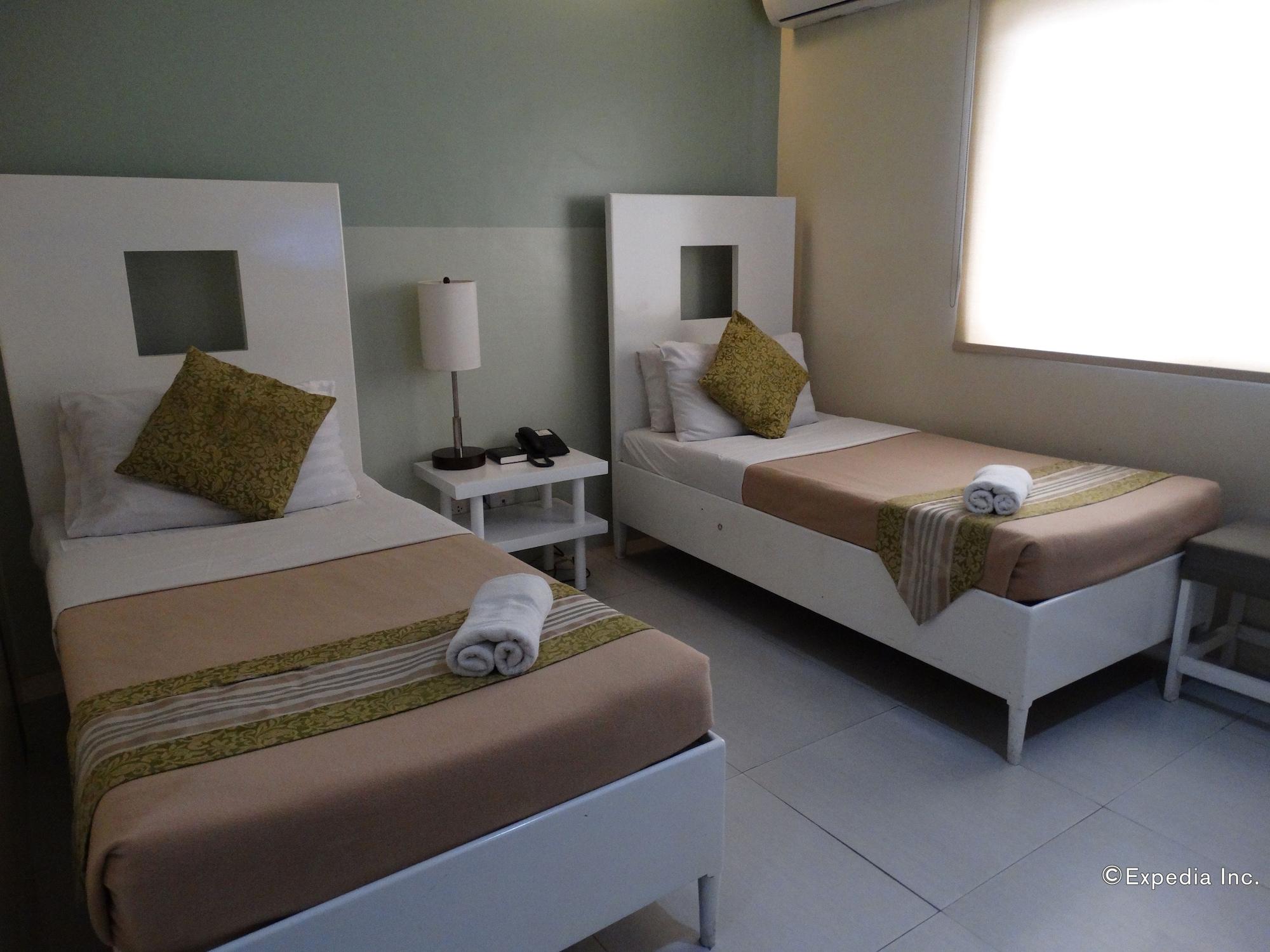 Empire Suites Hotel Puerto Princesa Екстериор снимка