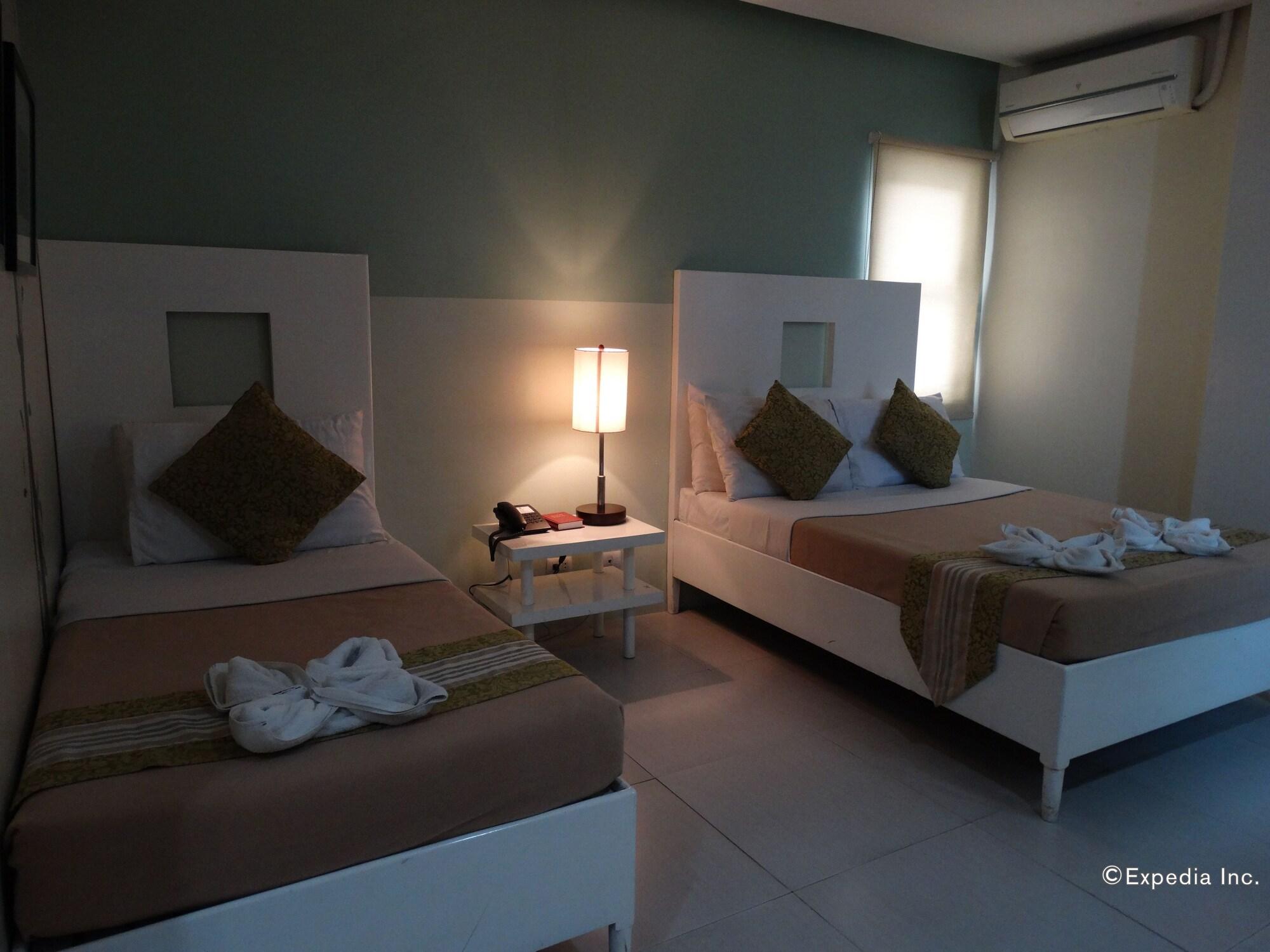 Empire Suites Hotel Puerto Princesa Екстериор снимка