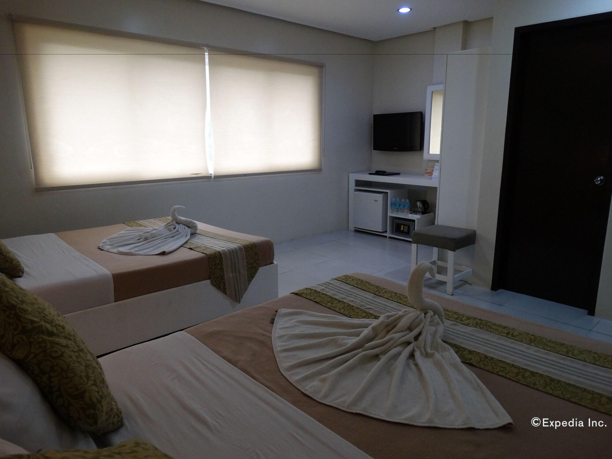 Empire Suites Hotel Puerto Princesa Екстериор снимка