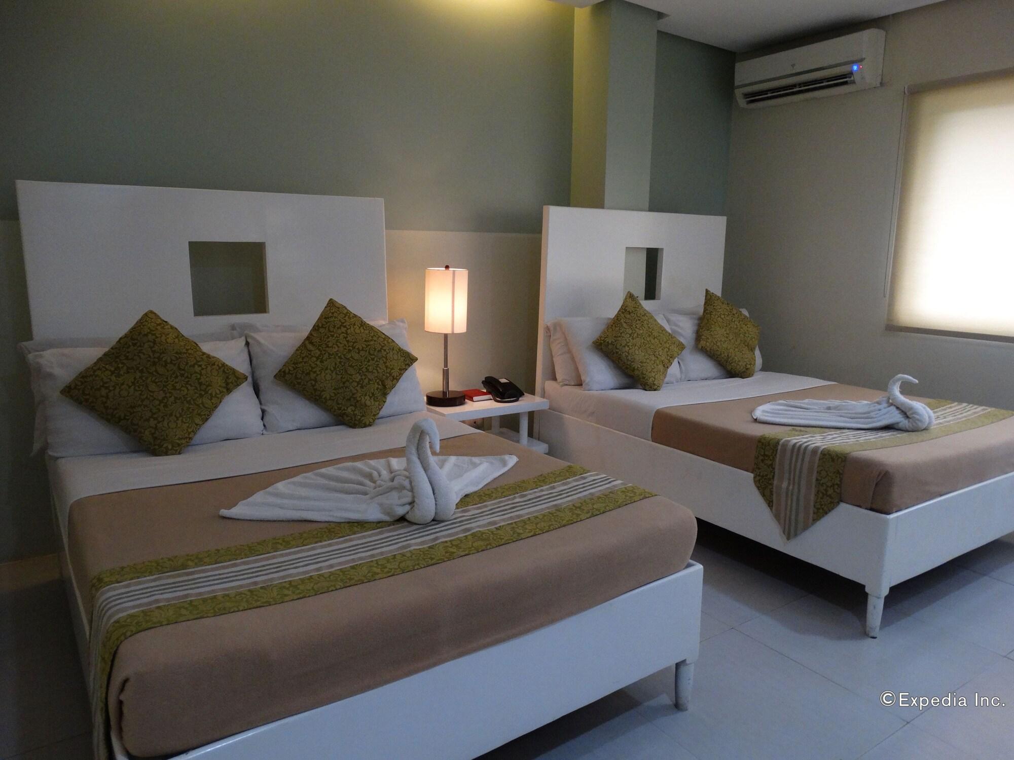 Empire Suites Hotel Puerto Princesa Екстериор снимка