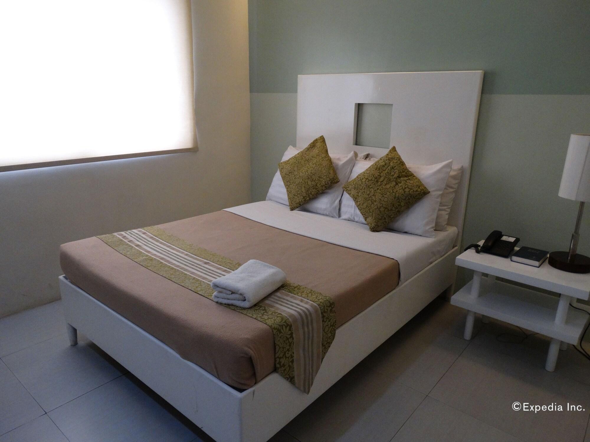 Empire Suites Hotel Puerto Princesa Екстериор снимка