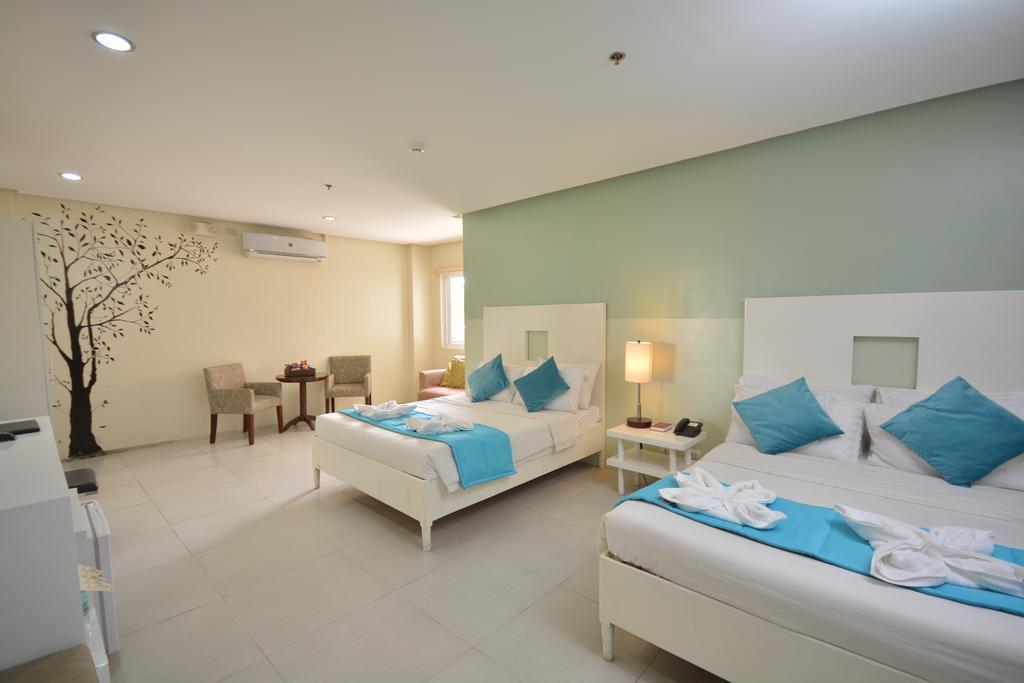 Empire Suites Hotel Puerto Princesa Екстериор снимка