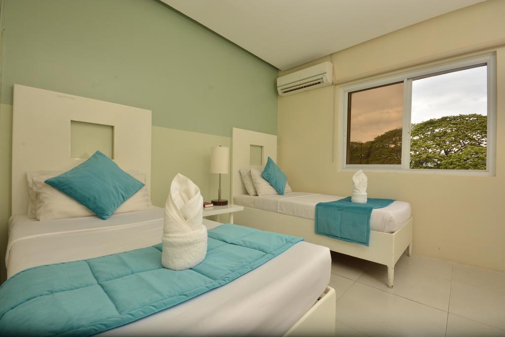 Empire Suites Hotel Puerto Princesa Екстериор снимка