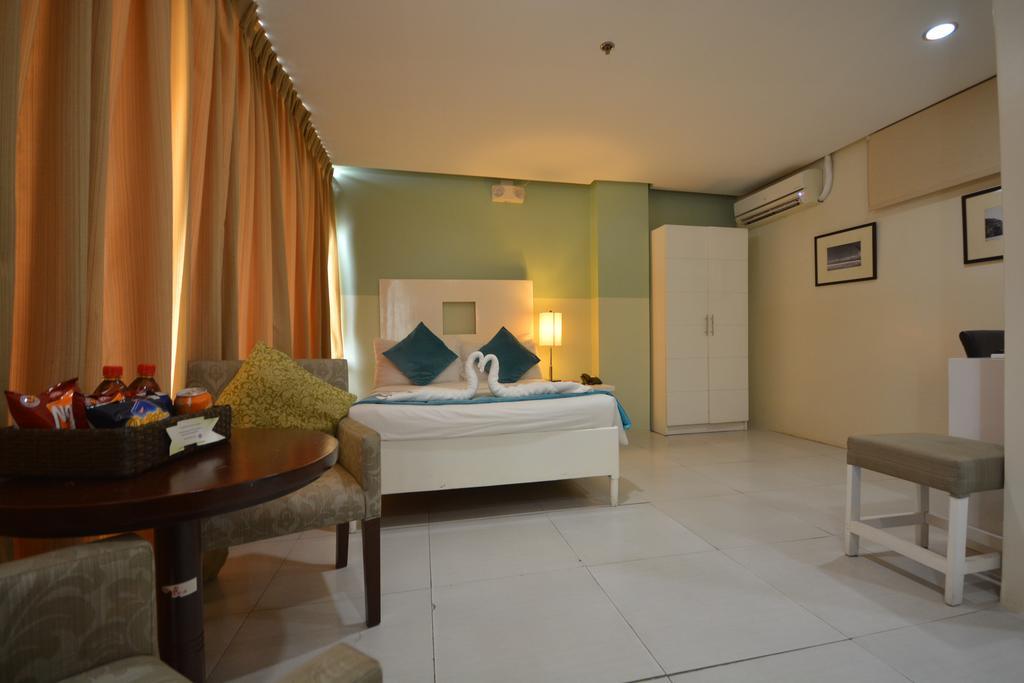 Empire Suites Hotel Puerto Princesa Екстериор снимка