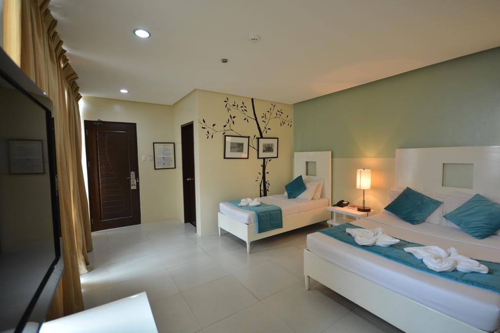 Empire Suites Hotel Puerto Princesa Екстериор снимка
