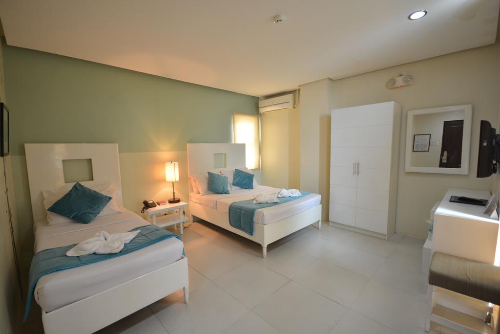 Empire Suites Hotel Puerto Princesa Екстериор снимка