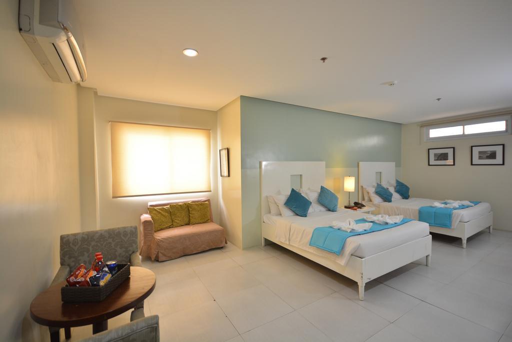 Empire Suites Hotel Puerto Princesa Екстериор снимка