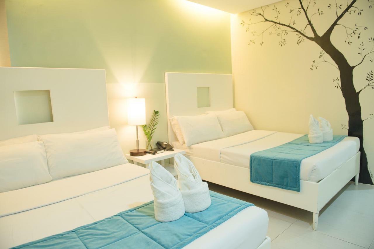 Empire Suites Hotel Puerto Princesa Екстериор снимка